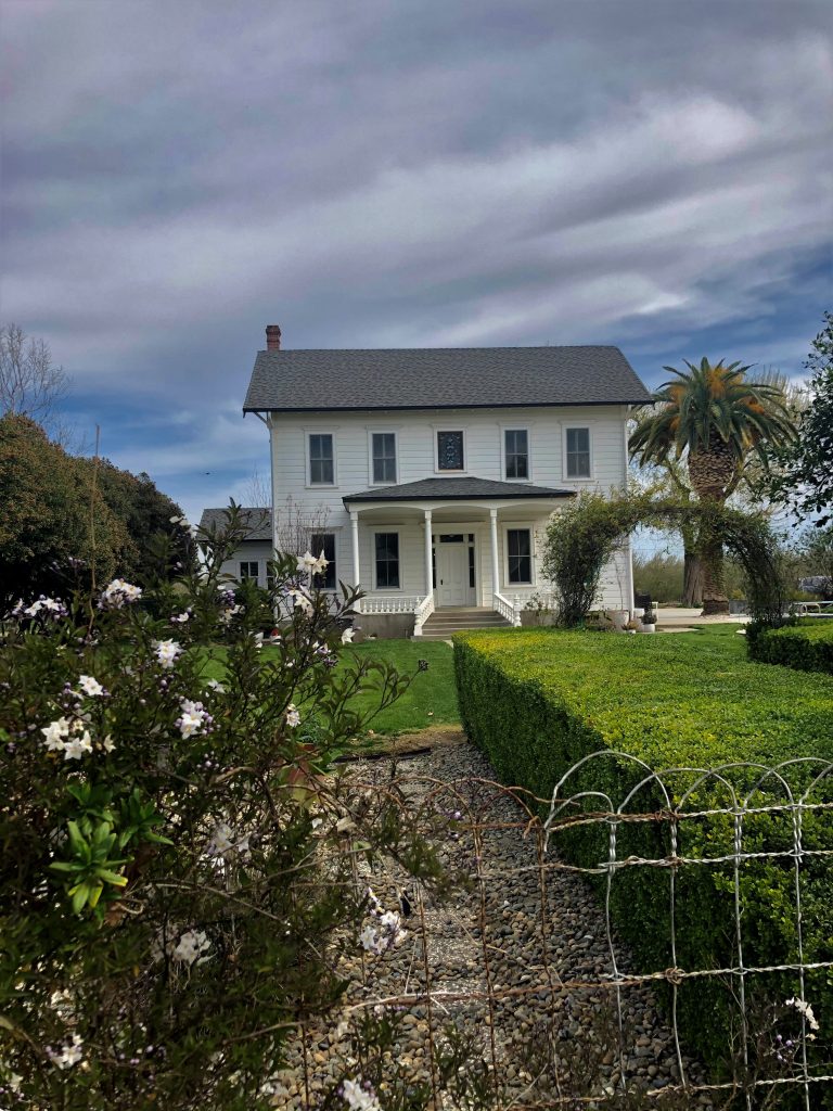 Abele Farms, Yolo County. Victorian area farm house. Wedding lawn with house as backdrop.