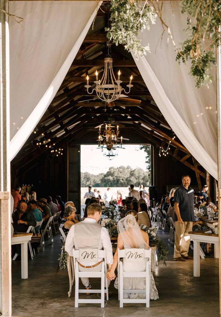 The Barn at Second Wind, Sacramento River Road, Country Farmland. Sweetheart table inside barn.