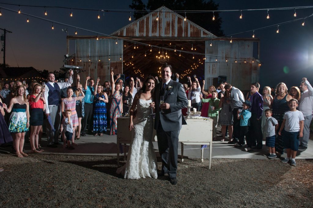 The Barn at Second Wind, Sacramento River Road, Country Farmland. Bride and Groom in front of barn.