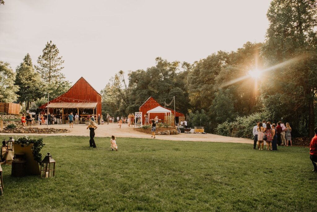 The Ranch at Stoney Creek, El Dorado County. Red Barns and meadow lawn.